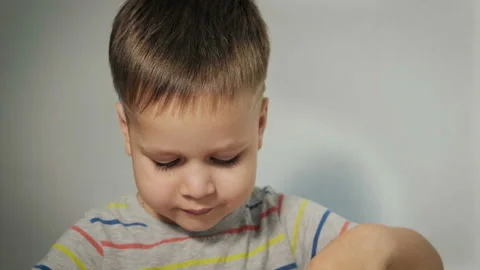 Happy child bites a piece of bread Stock Footage 102155533