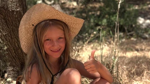 Happy Child Face Show Thumbs Up Laughing Little Girl Portrait Playing Outdoor 4K Stock Footage