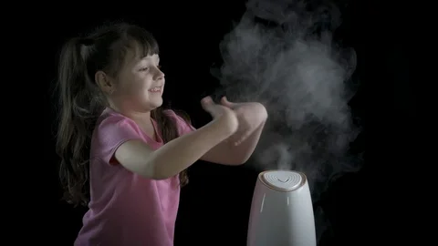 Happy child with a humidifier. Stock Footage 129339554