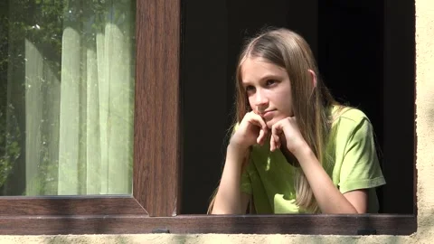 Happy Child Looking on Window, Smiling Kid, Bored Thoughtful Girl, Teenager Face Stock Footage 345155458