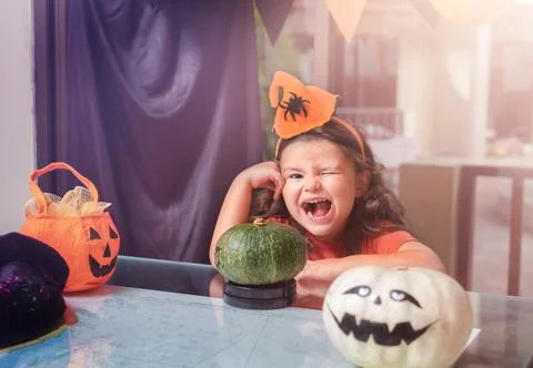 Happy child preparing pumpkins Stock Photos