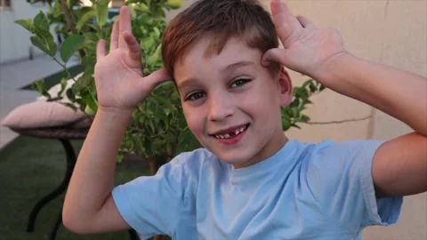 Happy child smiling at camera Stock Footage 220210720