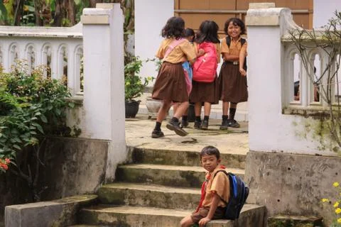 Happy children after school in Java, Indonesia Stock Photos