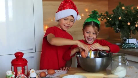 Happy children are preparing gingerbread on the eve of new year. Video stock 140368972