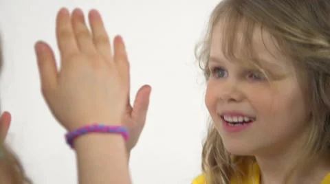 Happy children clapping hands in slow motion Stock Footage 58875722