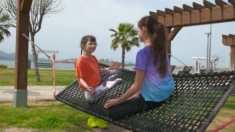 Happy children on a hammock. Stock Footage 231348604