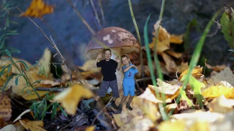 Happy children jumping and dancing In Autumn Forest Stock Footage 65401950