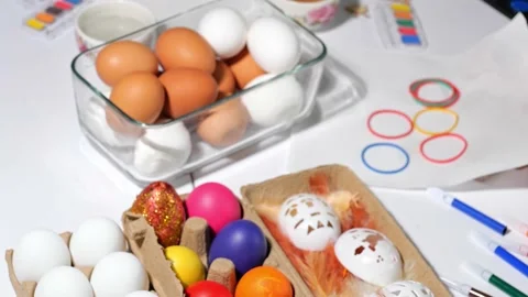 Happy children painting Easter eggs Stock Footage 163979500