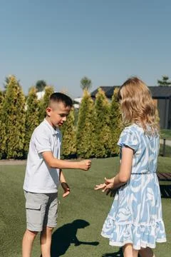 Happy Children Playing Together on Playground Stock Photos