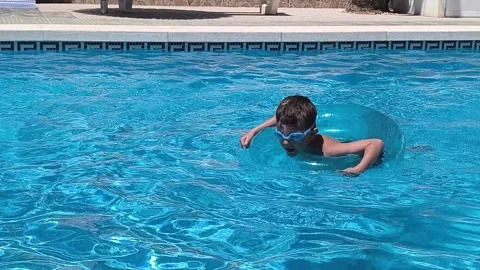 Happy children pool fun splash water happy summer kids splashing in pool kids Stock Footage 276855050
