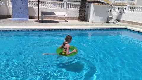 Happy children pool fun splash water happy summer kids splashing in pool kids Stock Footage 276855056