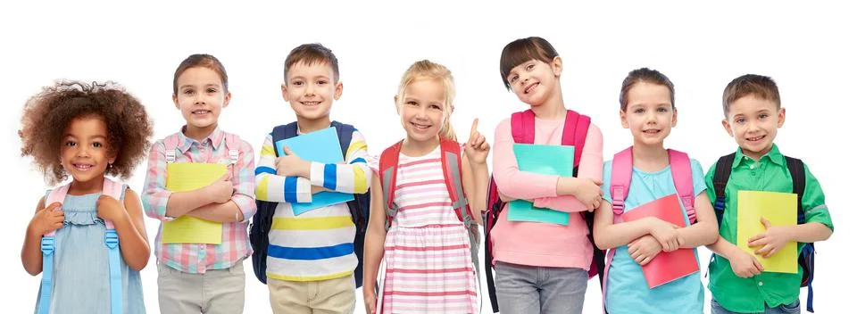 Happy children with school bags and notebooks Stock Photos