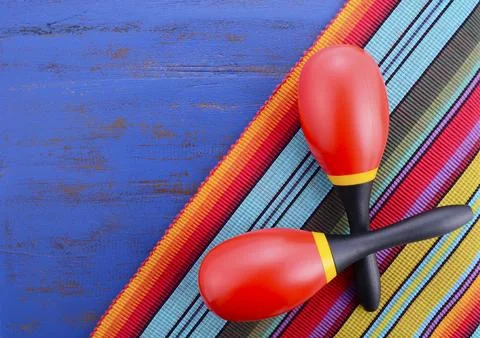Happy Cinco de Mayo background with colorful maracas on Mexican theme dark .. Stock Photos