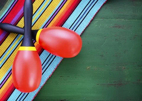 Happy Cinco de Mayo background with colorful maracas on Mexican theme dark .. Stock Photos