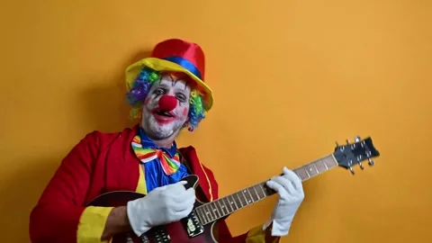 Happy clown making funny gestures. Video stock 295843886