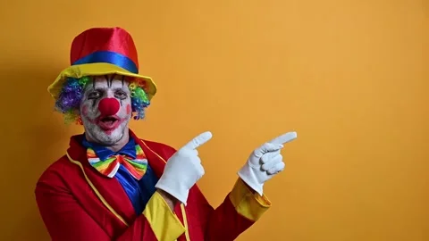 Happy clown making funny gestures. Video stock 295843887