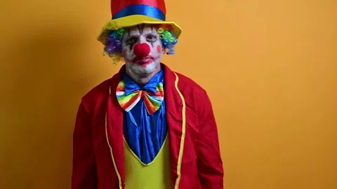 Happy clown making funny gestures. Video stock 295843896