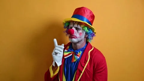 Happy clown making funny gestures. Video stock 295843899