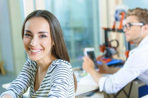 Happy colleagues using three dimensional technology Stock Photos