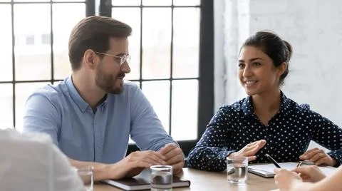 Happy confident startup leaders meeting with partners or investors Stock Photos