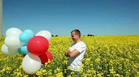 Happy couple with balls Stock Footage 11103849