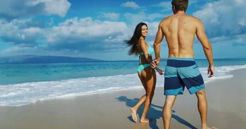 Happy Couple on the Beach Stock Footage 81226590