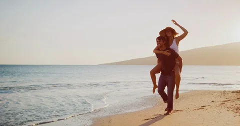 Happy couple on the beach Stock Footage 106509163
