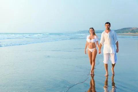 Happy couple on a beach Stock Photos