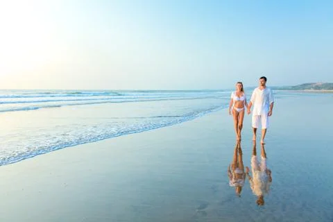 Happy couple on a beach Stock Photos