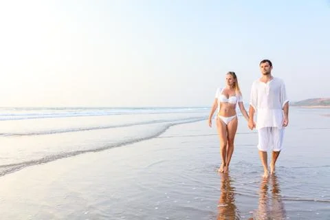 Happy couple on a beach Stock Photos