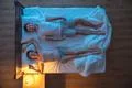 The happy couple on the bed. evening night time. view from above Photo