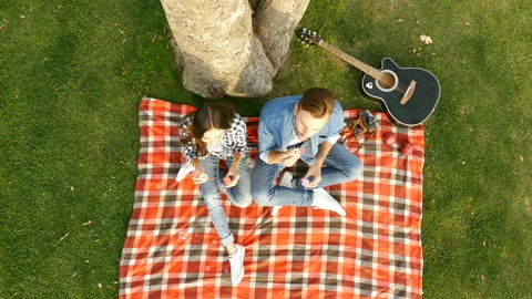 Happy couple is blowing bubbles. Top view. Stock Footage 100145198