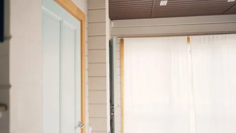 Happy couple bringing boxes with personal things after relocation to new house Stock Footage 104044104