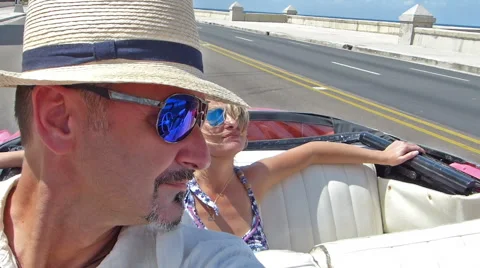 Happy couple in a cabriolet Stock Footage 46668059