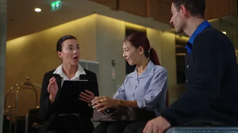A happy couple checking in at the hotel reception Stock Footage 316367442