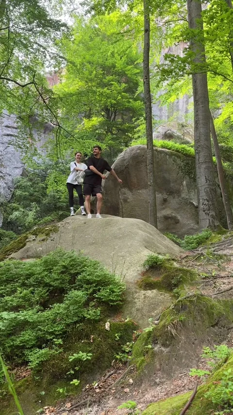 Happy couple dancing on the rock Stock Footage 245148952