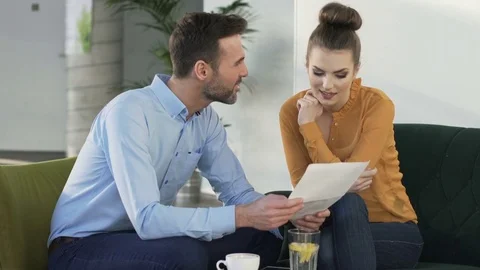 Happy couple discussing  at cafe Stock Footage 70807777
