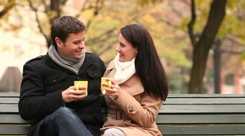 Happy couple drinking tea in fall Video stock 9784988