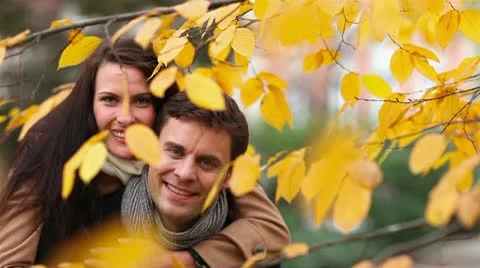 Happy couple in fall park Stock Footage 9776094