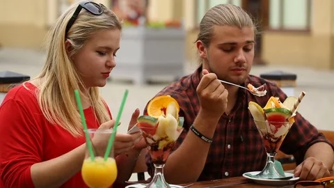 Happy couple having a date in the restaurant and chatting Stock Footage 77484658