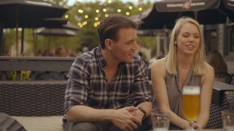 Happy Couple having Drinks on Date 1 Stock-Footage 92548630