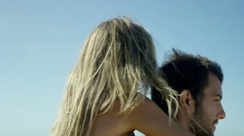 Happy couple having fun on beach Stock-Footage 49605245