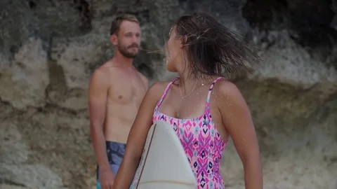 Happy Couple having fun on the Beach in Bali Stock Footage 71575974