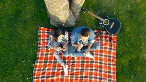 Happy couple having fun with bubble blowers. Stock Footage 95475827