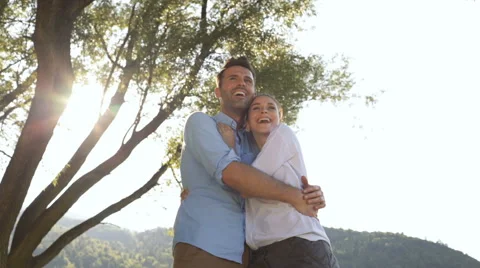 Happy couple having fun, hugging outdoors. Stock Footage 63195223