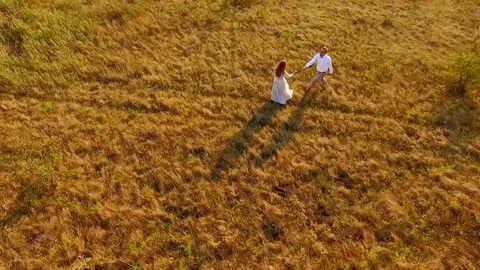 Happy couple having fun meadow. loving couple enjoys life on the nature in the Stock Footage 80036387