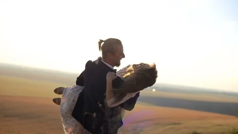 Happy couple having fun on the meadow Stock Footage 82260053