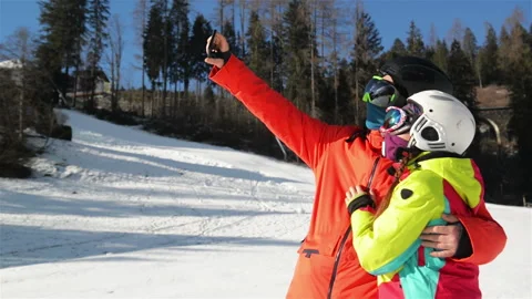 Happy Couple Having Fun On The Snow And Making Selfie. Smiling Couple. They Have Stock Footage 101666880
