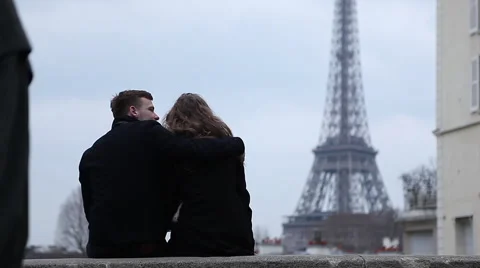 Happy couple having a good time in Paris at the Eiffel Tower Stock Footage 64055005