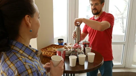 Happy couple having a snack break drinking tea Stock Footage 59582206